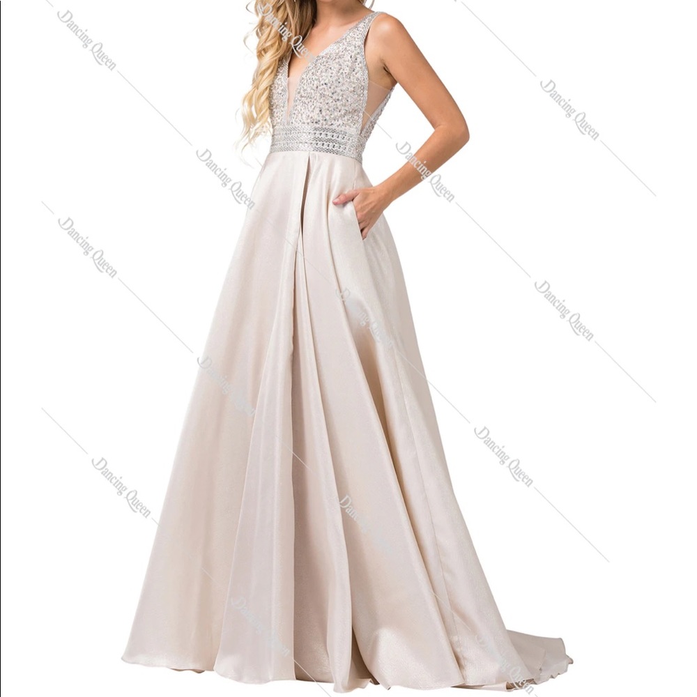 Dancing Queen Champagne Gown in Size XS. Great condition!